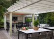 Outdoor dining by the pergola