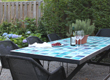 A ceramic table in blue accents the outdoor area